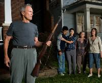 (L-r) Walt Kowalski (CLINT EASTWOOD), Thao (BEE VANG), Vu (BROOKE CHIA THAO), Grandma (CHEE THAO) and Sue (AHNEY HER) in Warner Bros. Pictures’ and Village Roadshow Pictures’ drama “Gran Torino,” distributed by Warner Bros. Pictures. PHOTOGRAPHS TO BE USED SOLELY FOR ADVERTISING, PROMOTION, PUBLICITY OR REVIEWS OF THIS SPECIFIC MOTION PICTURE AND TO REMAIN THE PROPERTY OF THE STUDIO. NOT FOR SALE OR REDISTRIBUTION.