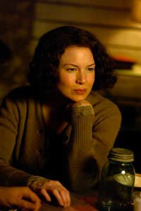 RENÉE ZELLWEGER as Jim Braddock's devoted wife, Mae, in Cinderella Man.  Cinderella Man is produced by Brian Grazer, Ron Howard and Penny Marshall and directed by Ron Howard.           The film is a Universal Pictures/Miramax Films co-production of an Imagine Entertainment presentation. Distributed by Buena Vista International.